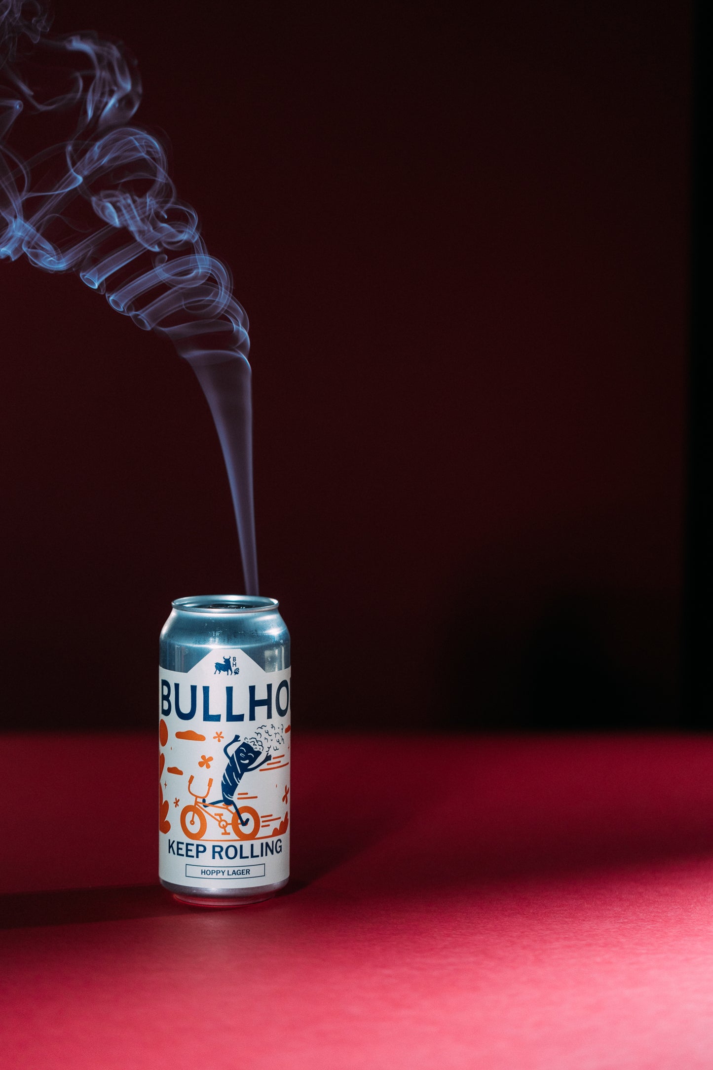 
                  
                    Bullhouse beer can with smoke effect on a red background
                  
                